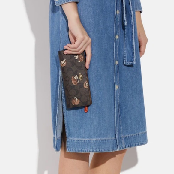 Coach Handbags - Coach Slim Wallet In Signature Canvas With Hedgehog Print
Gold/Brown Black Multi